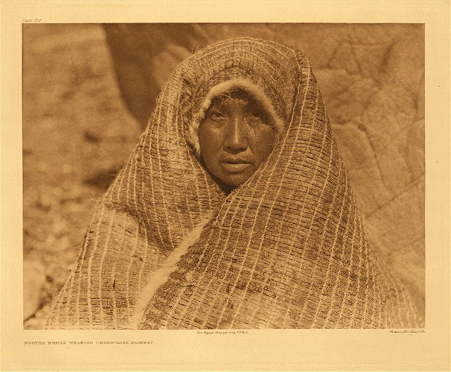 Edward S.Curtis - Nootka Woman Wearing Cedar Bark Blanket.jpg